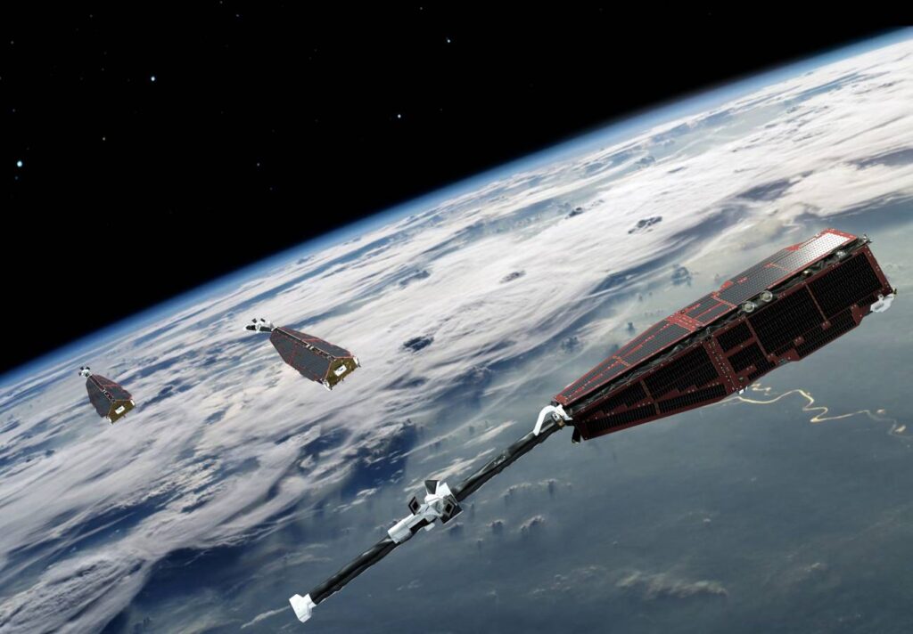 Ilustración digital de los tres satélites de la misión Swarm de la ESA