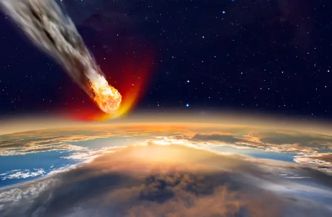 Ilustración digital de un asteroide entrando a la Tierra